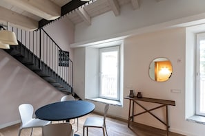 Junior Quadruple Room, City View | Dining