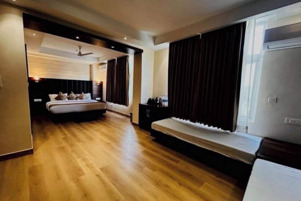 Habitación Deluxe con 1 cama matrimonial o 2 individuales, vista a la ciudad | Wifi gratis