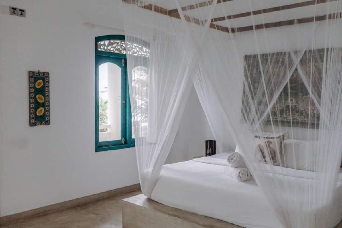 Deluxe Suite, Balcony, Sea View | Premium bedding, down comforters, memory foam beds, in-room safe