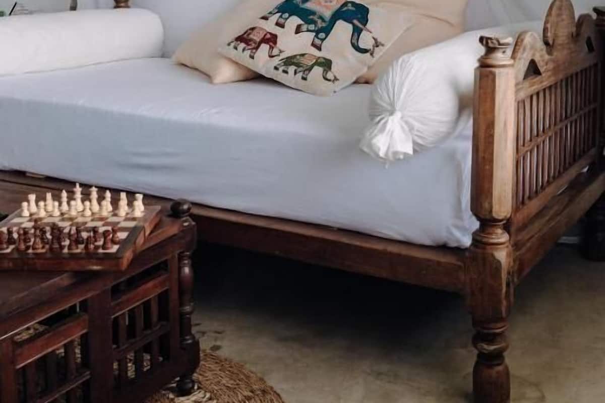 Premium bedding, down comforters, memory foam beds, in-room safe