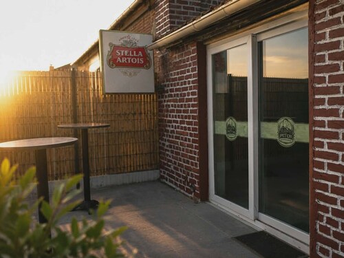 Group vacation rental at Pet'ch's Domaine du Reuze, with bike, bar, and laser tag options