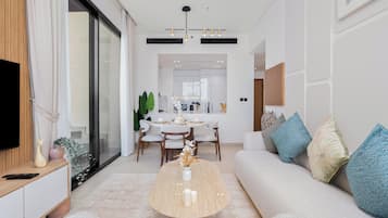Exclusive Apartment, Private Pool, Pool View | Living area | 55-inch Smart TV with digital channels, Netflix, Hulu