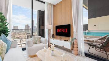 Exclusive Apartment, Private Pool, Pool View | Living area | 55-inch Smart TV with digital channels, Netflix, Hulu
