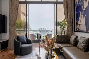 Apartemen, balkon, pemandangan kota | Area keluarga