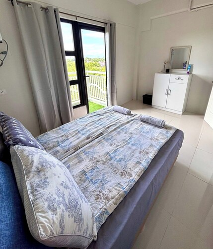 Peaceful 1-bedroom condo with access to pool, gym, and playground in Bohol