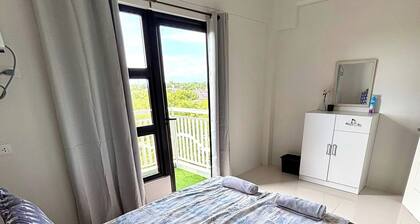 Peaceful 1-bedroom condo with access to pool, gym, and playground in Bohol