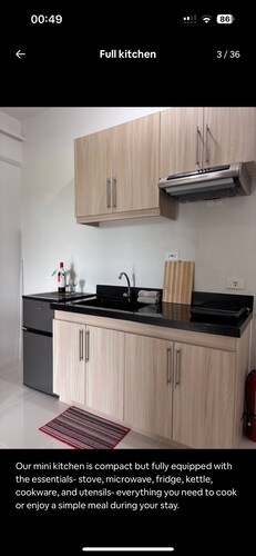Peaceful 1-bedroom condo with access to pool, gym, and playground in Bohol