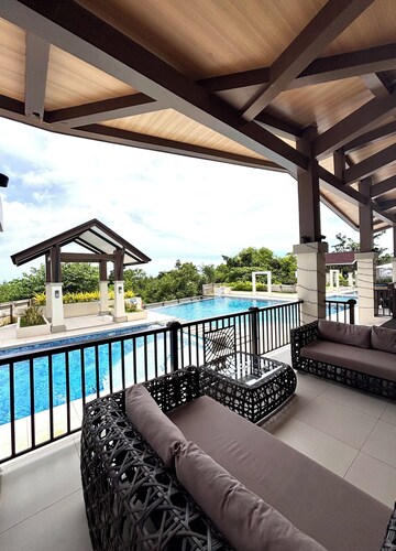 Peaceful 1-bedroom condo with access to pool, gym, and playground in Bohol