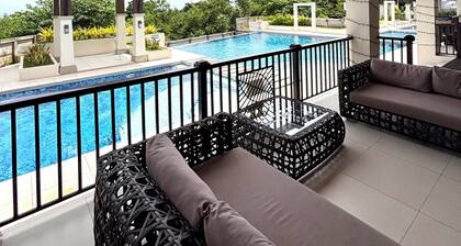 Peaceful 1-bedroom condo with access to pool, gym, and playground in Bohol