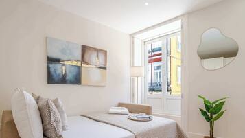 1 habitación, tabla de planchar con plancha, cuna de viaje y wifi