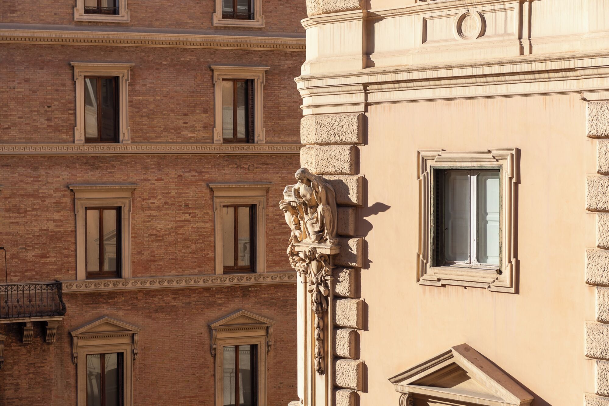 A building facade with multiple windows and a classical architectural style.