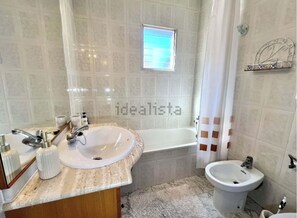 Hair dryer, bidet, towels, soap