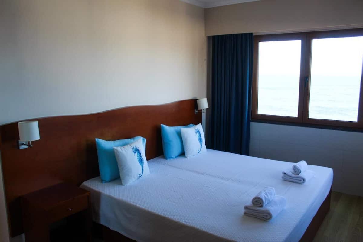 Apartment, 2 Bedrooms, Balcony, Sea View | Blackout drapes, iron/ironing board (on request), WiFi (free)