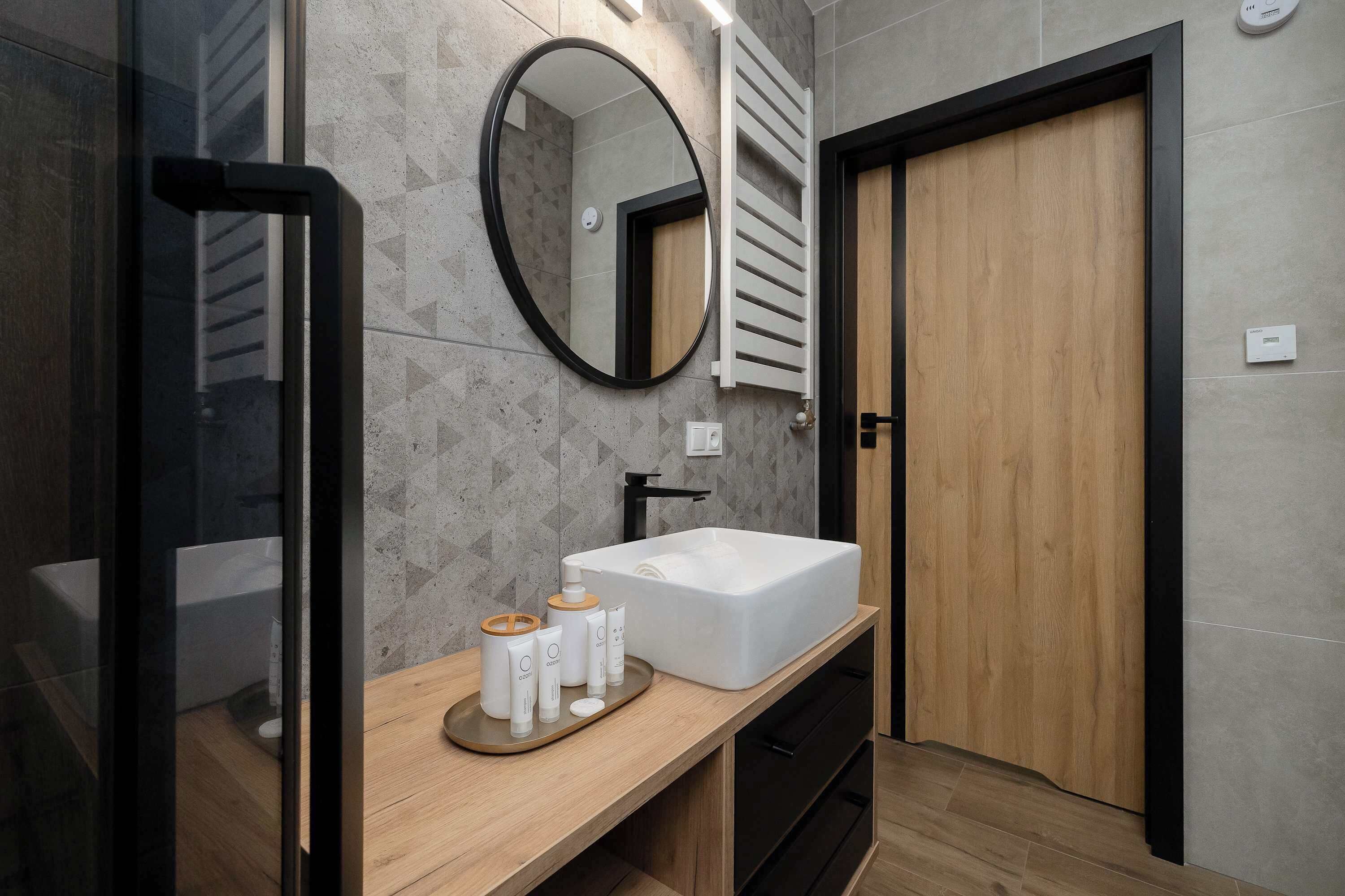Shower, hair dryer, towels, shampoo