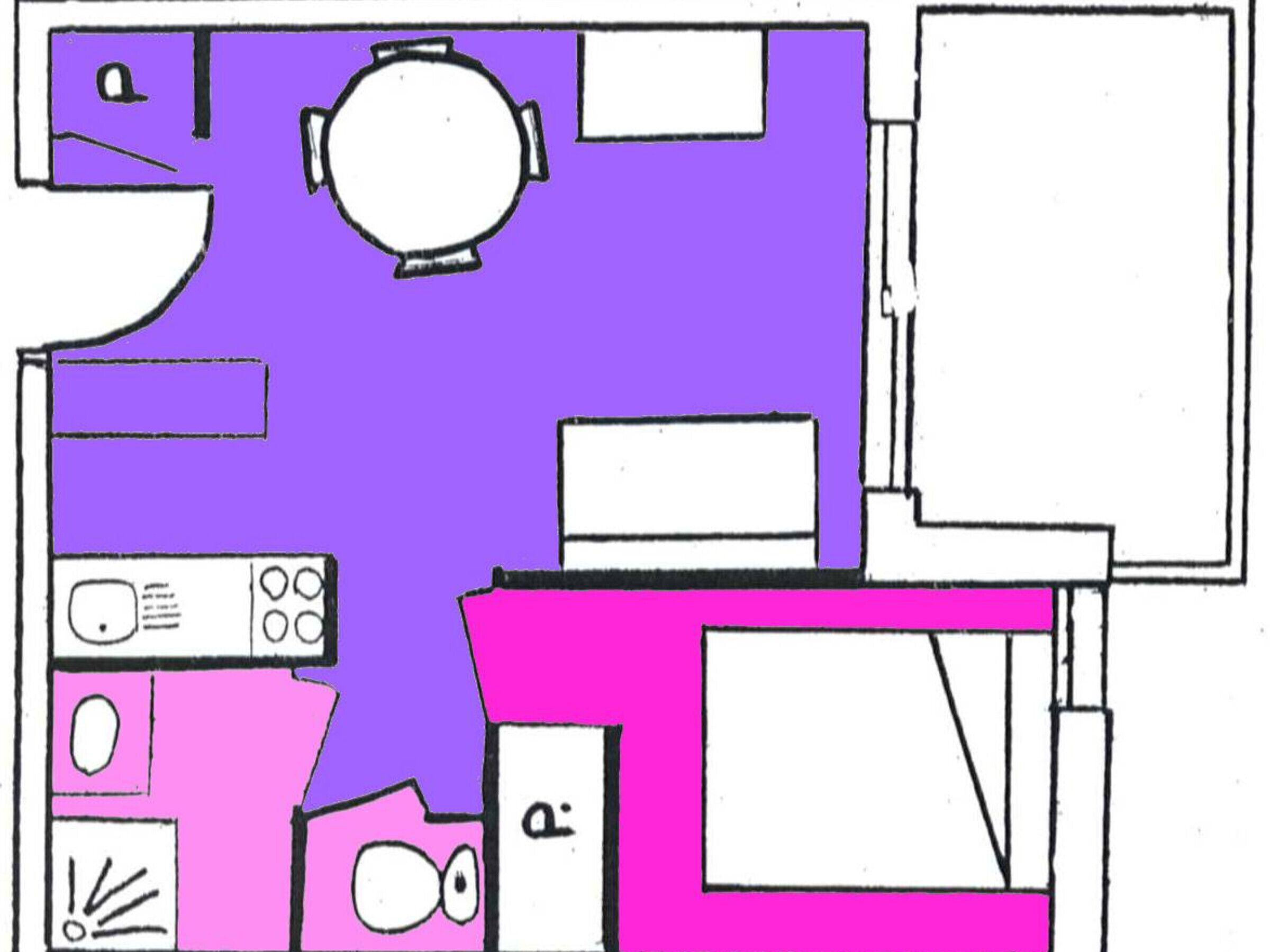 A room with a purple and pink color scheme, a round table, a bed, and a window.