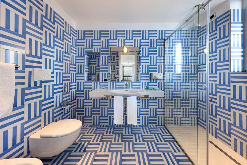 Superior Double Room, Balcony, Sea View | Bathroom | Slippers