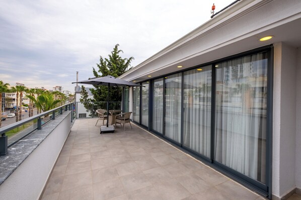 Suite, vistas a la ciudad | Terraza o patio