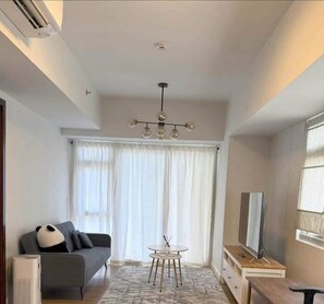 Comfort Apartment, City View | Living area - Camella Homes Woodhills (San Pedro)