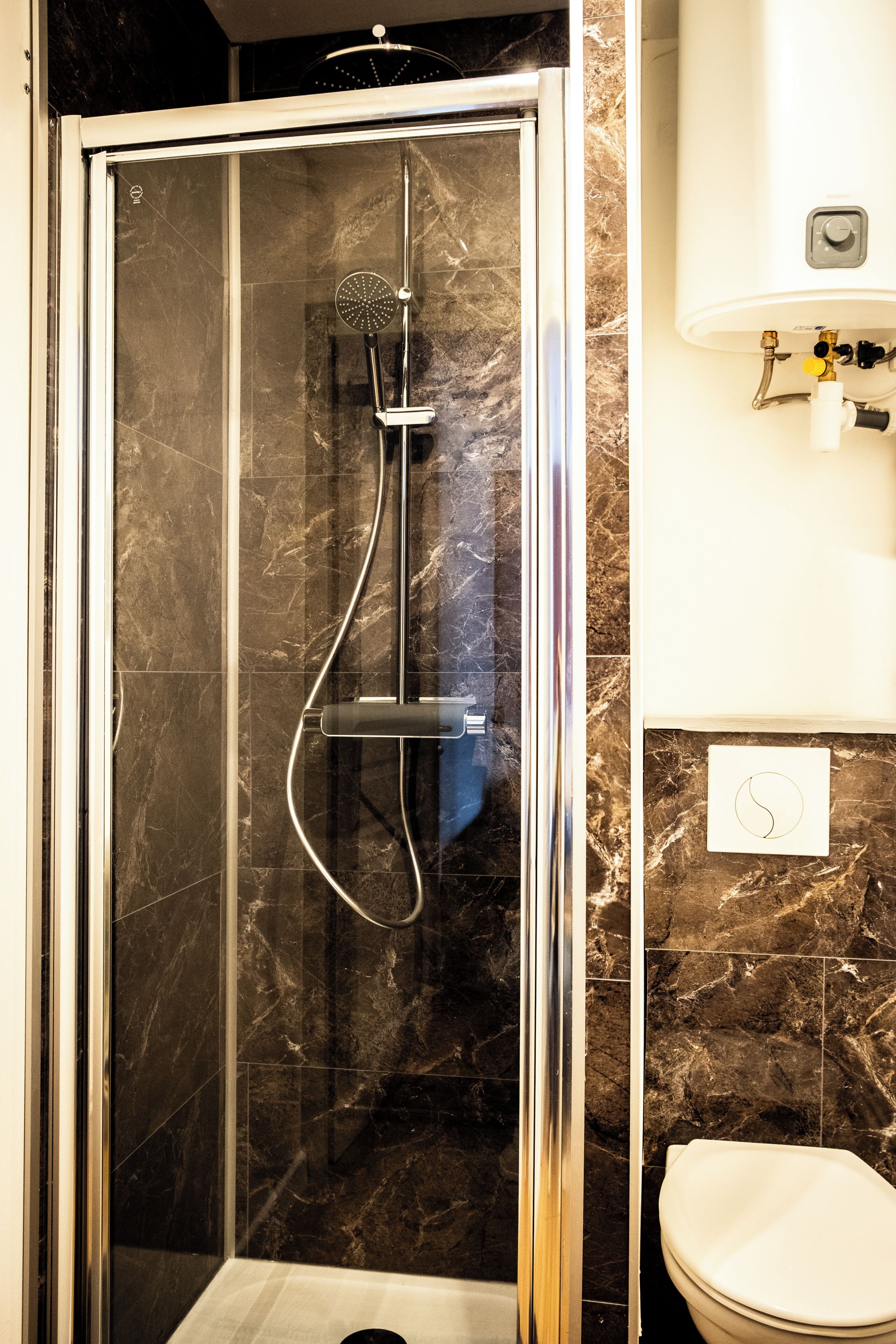 Shower, towels, toilet paper