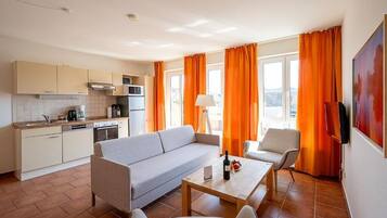 Apartamento superior | Zona de estar