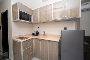 ห้องสวีท, 1 ห้องนอน, วิวเมือง | ครัวส่วนตัว