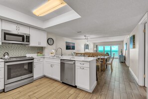 Fridge, microwave, oven, stovetop - 🌞Beachfront Condo🌴Sunset Views | Heated Pool + Tennis | Sea Oats 303 (Redington Shores)