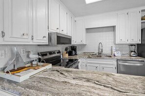 Private kitchen - Classic Beach Cottage | Gulf Views + Wraparound Deck (Dauphin Island)