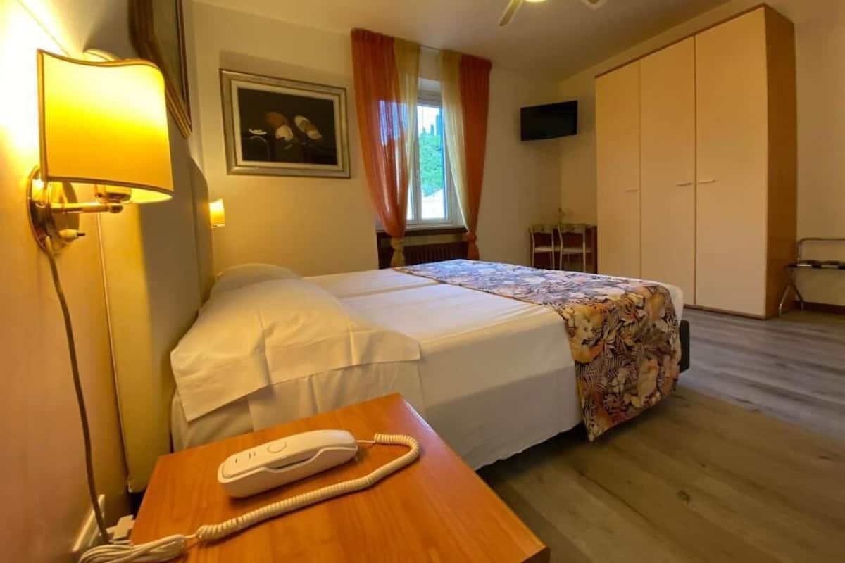 Economy Twin Room, Courtyard View | In-room safe, soundproofing, free WiFi