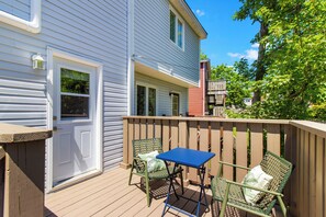 Enjoy your morning coffee or unwind in the evening on the private back deck overlooking the fenced yard. - Welcome to The Crossing, a thoughtfully restored 3-bedroom home on a quiet residential street in historic St. John's. Enjoy free off-street parking, a private fenced yard, and all the comforts of home—just minutes from the best of St. John's. (St. John's)