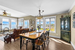 Gather and Dine Together - Welcome to Westward – Sunsets over Trinity, a premium oceanfront retreat overlooking beautiful Trinity Bay. Sleeps 4 with 1 King and 1 Queen bed, breathtaking sunsets, a fully equipped kitchen, Wi-Fi, laundry, self check-in, and free parking. (Hearts Delight)