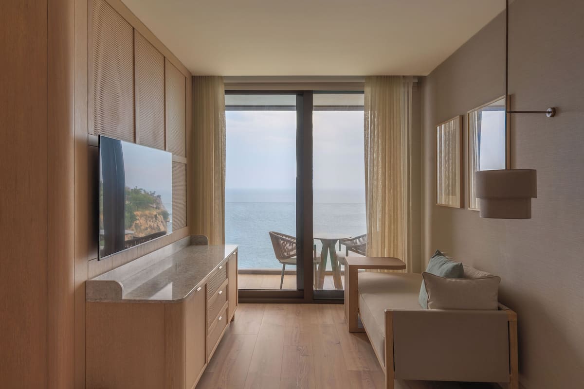 Habitación Deluxe, balcón, vistas al mar | Zona de estar