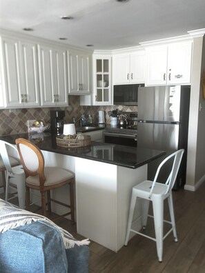 Private kitchen - Serene 2-bedroom condo with AC in charming Galveston (Galveston)