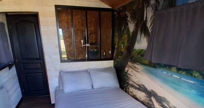 Camille's trailer with a spa-style relaxation area at the Domaine du Reuze