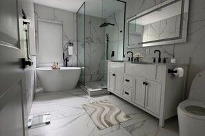 Bathroom - Sleek&Serene:Fully Furnished Home w/ Freestanding Tub, Marble Tile & Cozy Lounge (Woodbury)