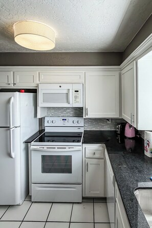 Unclassified image, 4 of 88, button - Town House (Norman)