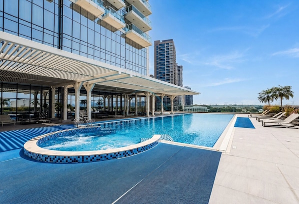 Pool - Serene Skyline View Studio Near JVT Park with Seamless Access to SMBZ Road (Dubai)