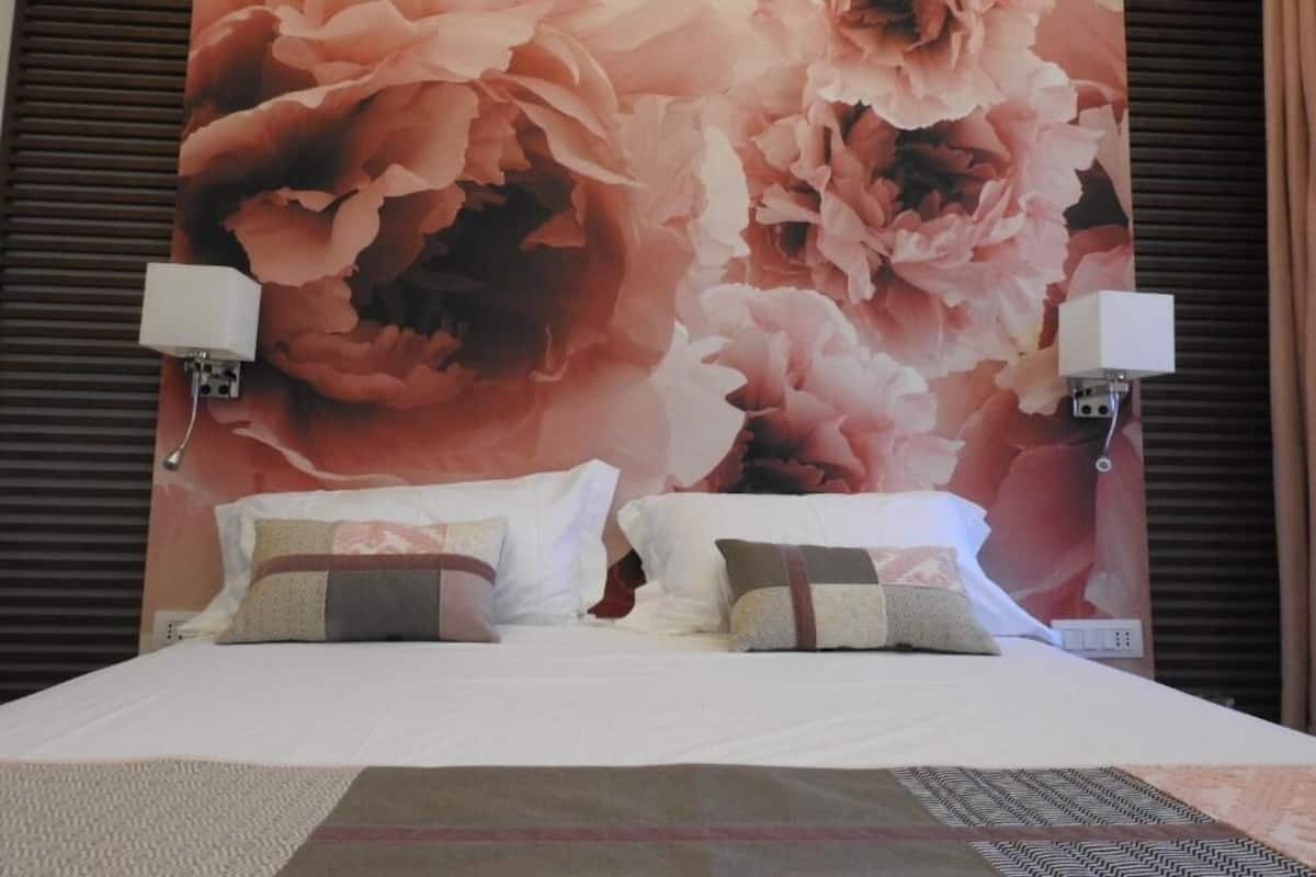 Deluxe Double Room, Balcony, Partial Ocean View | In-room safe, blackout curtains, soundproofing, free WiFi