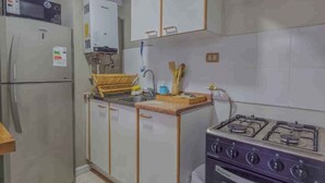 Departamento clásico, vista a la ciudad | Cocina privada
