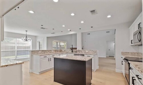 Spacious 5-BD/2.5-BA ft a Pool Oasis and BBQ Grill