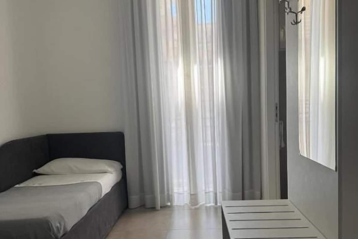 Habitación cuádruple familiar, balcón, vista a la ciudad | Wifi gratis