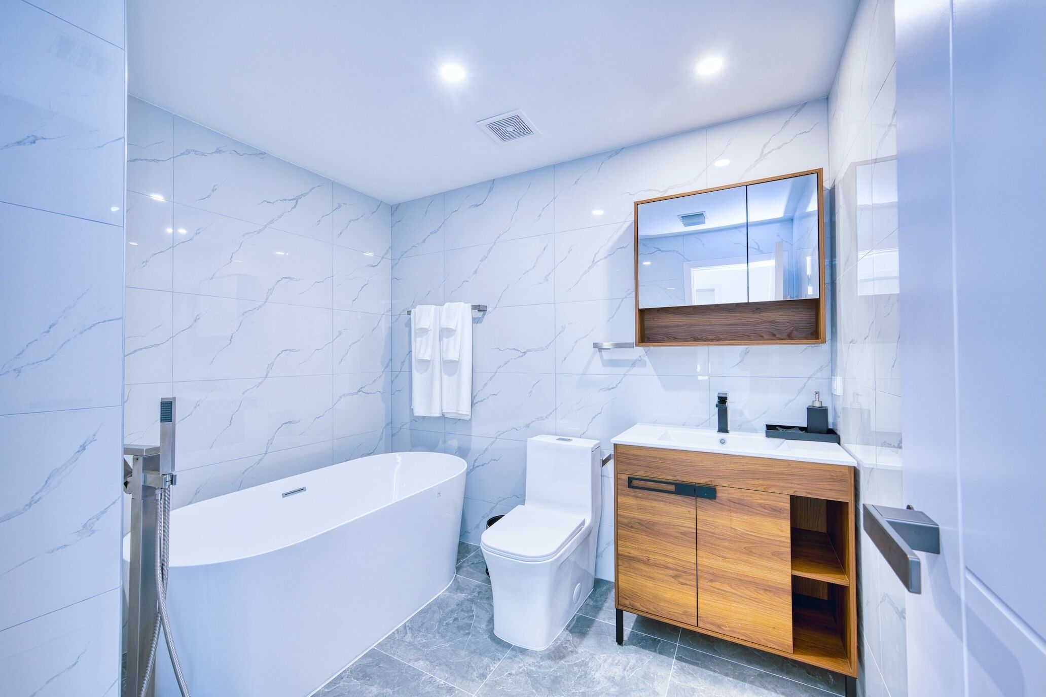 Shower, towels, soap, toilet paper