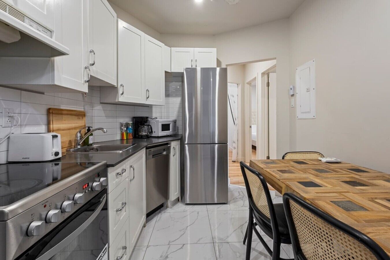 Coffee/tea maker, fridge, microwave, oven