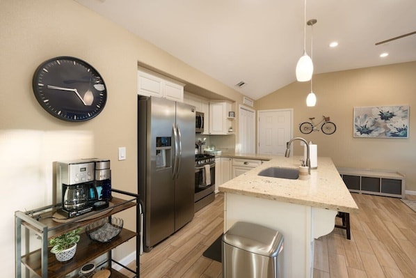 Coffee/tea maker, fridge, microwave, oven