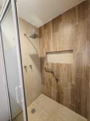 Shower, towels, soap, toilet paper