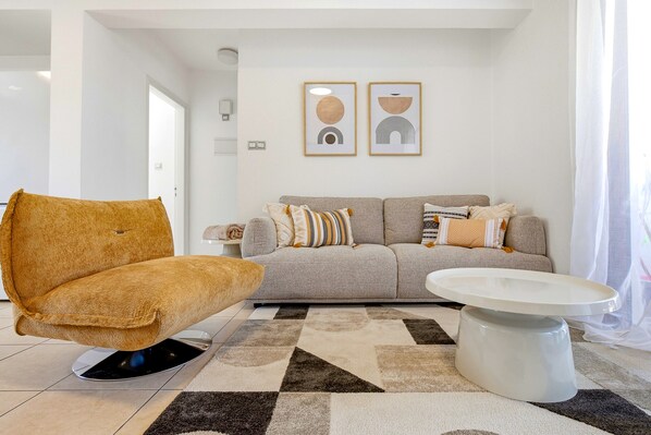 Living area - Erato Gardens Modern Apartment By VICHY Holidays (Paphos)