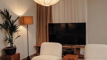 Apartment, 3 Bedrooms, Executive Level | Living area | Toys