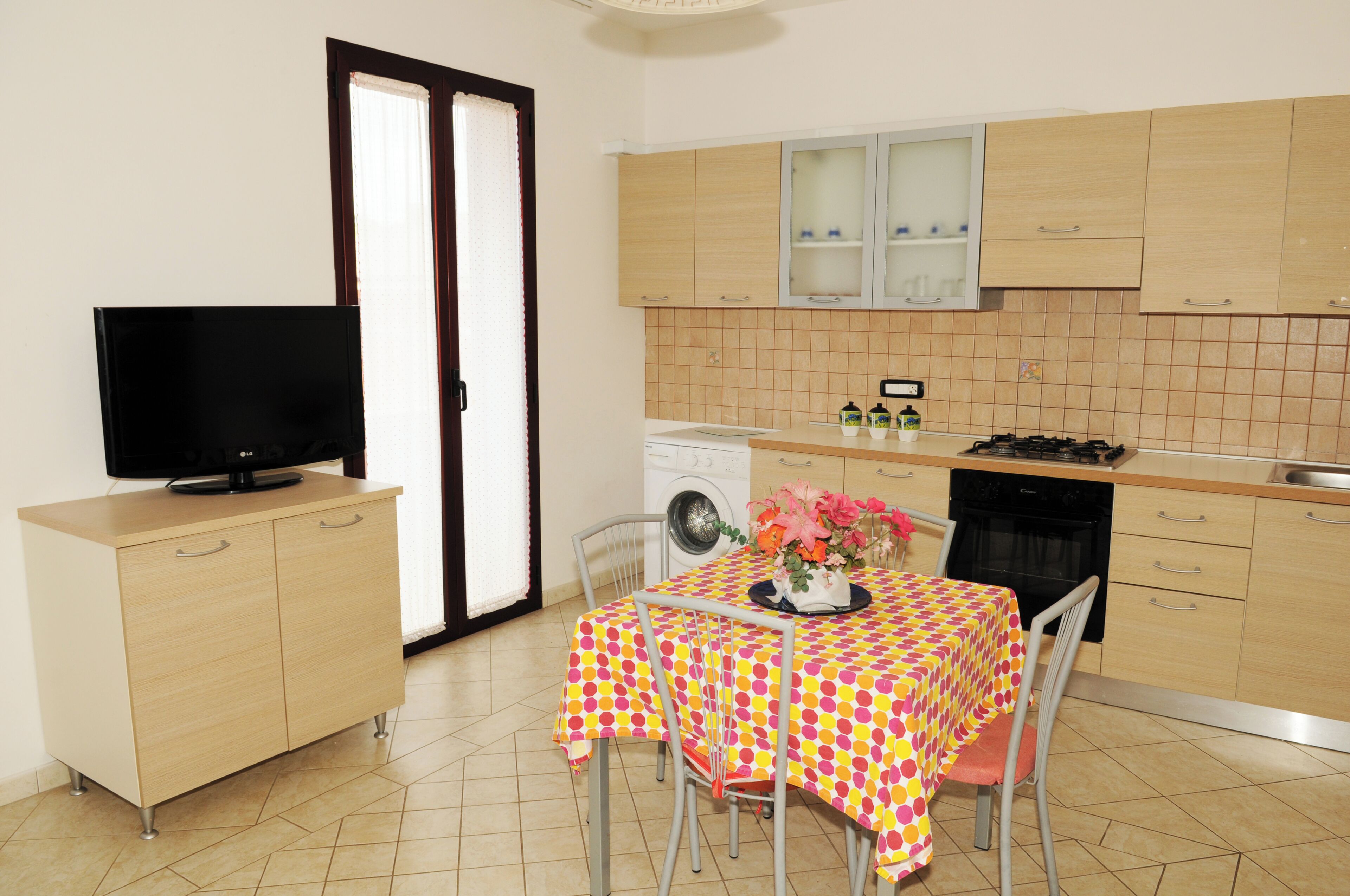 Apartment, Garden View | Private kitchen | Full-size fridge, oven, stovetop, cookware/dishes/utensils