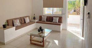 Departamento, patio, vista al jardín | Área de sala de estar