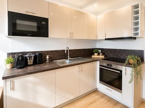 Coffee/tea maker, fridge, oven, stovetop - Ocean and Marina View · Terrace · Sleeps 4 · Riviera (Villeneuve-Loubet)