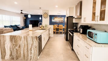 Coffee/tea maker, fridge, microwave, oven